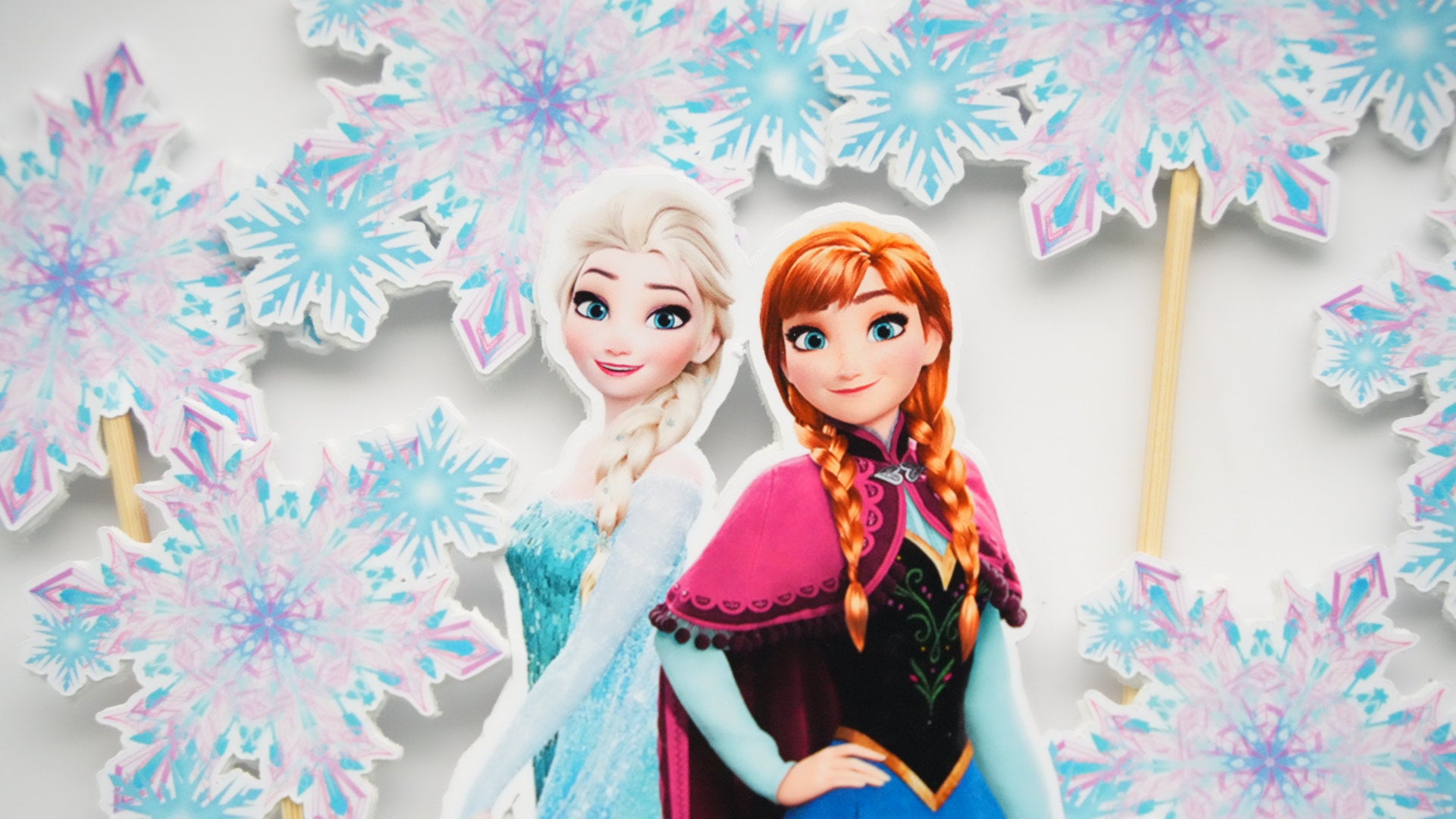 Topper Frozen Anna & Elsa din carton pentru tort copii